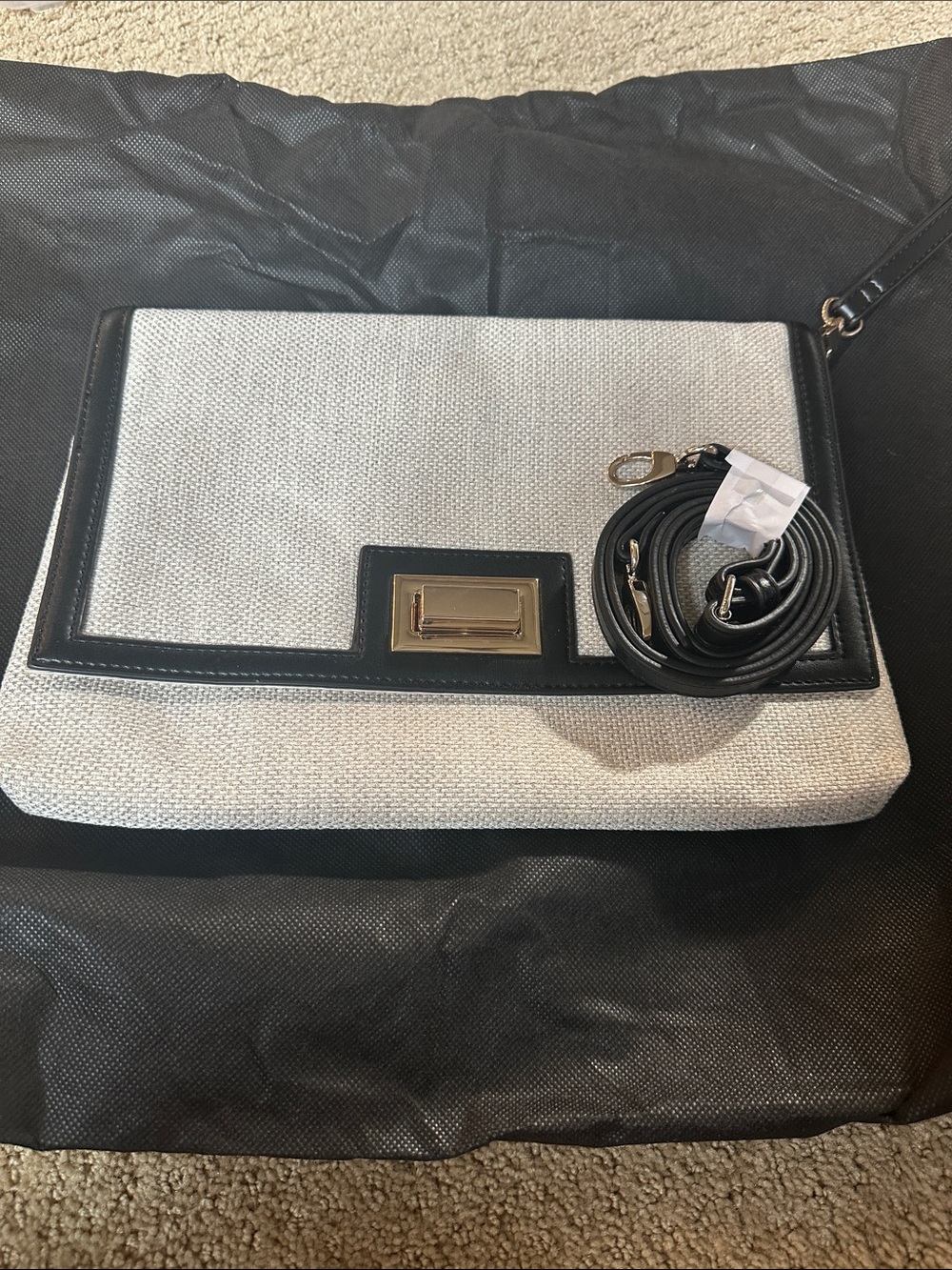 White House Black Market Chic Black and Cream Convertible Crossbody Clutch